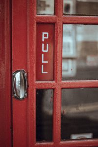 Red telephone box handle, photo from https://stocksnap.io