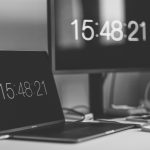Image of time showing on two computers by Markus Spiske from Unsplash